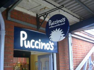 Puccnios Exterior Storefront Signage in Austin, TX - Georgetown Sign Company